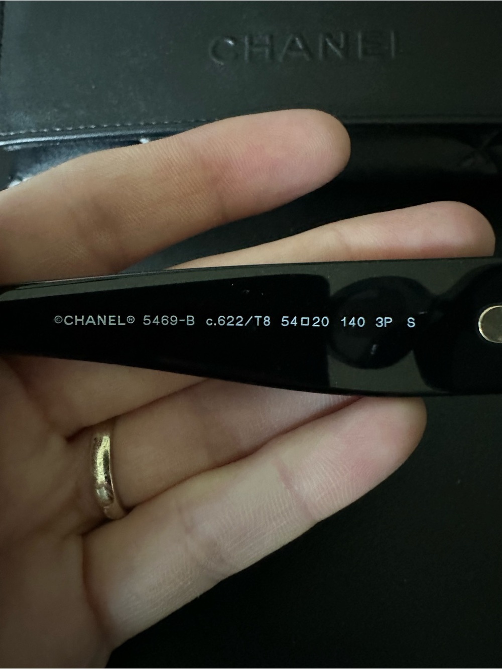CHANEL Black Oval Sunglasses with Gold Logo Accent - Picture 6 of 6